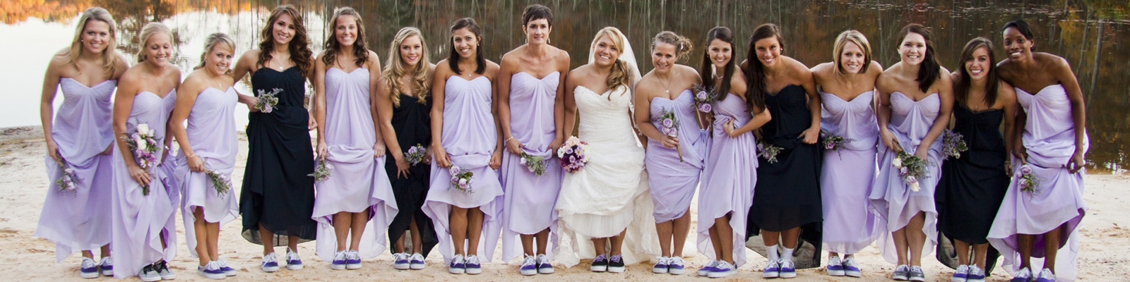 Brides maids in lined up on the beach